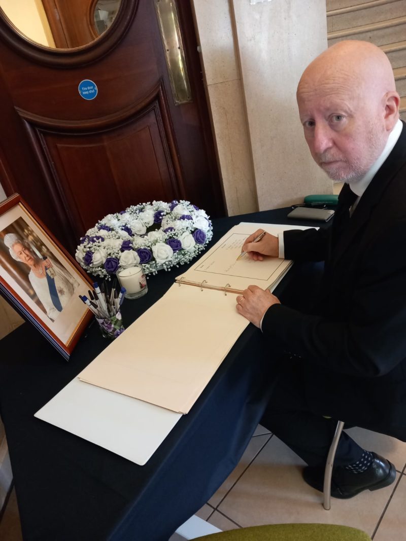 Signing the book of condolence